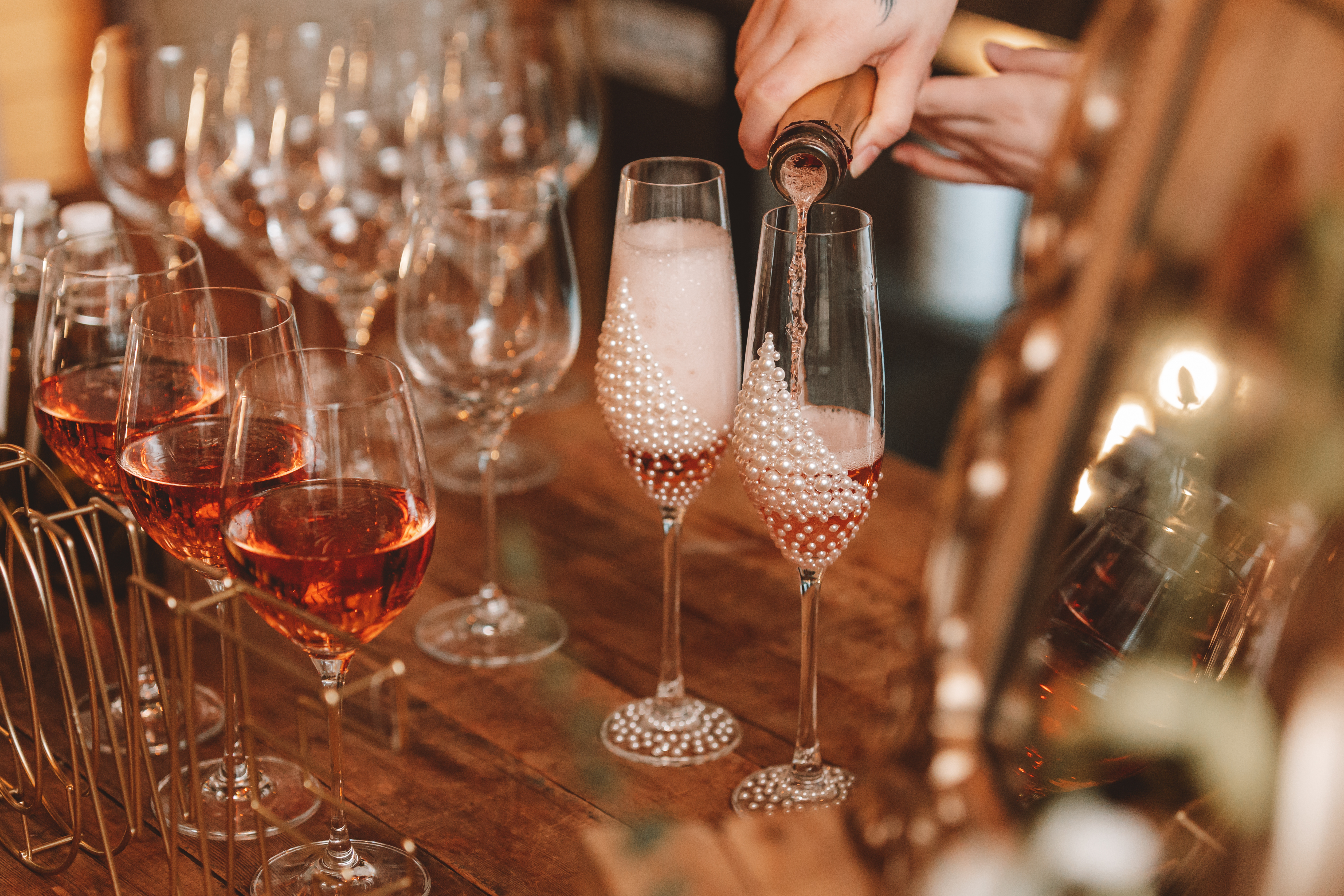 a picture of a glass of champagne being poured